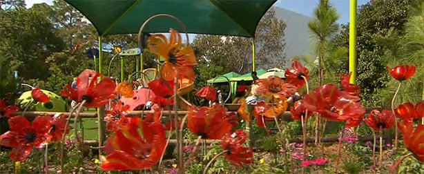 There is an assortment of real and Disney flowers to add beauty to the area.