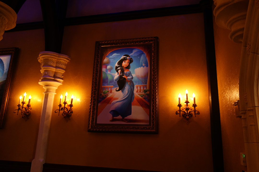 The photo hall has several beautiful pieces of art for some of Disney's most popular Princesses.  They were actually drawn by the artist that creates the children's Golden Books. Jasmine will only appear here VERY rarely.  She STILL meets in Agrabah/Morocco.   If you see a CROWN on the photo outside, you might meet a less common princess.