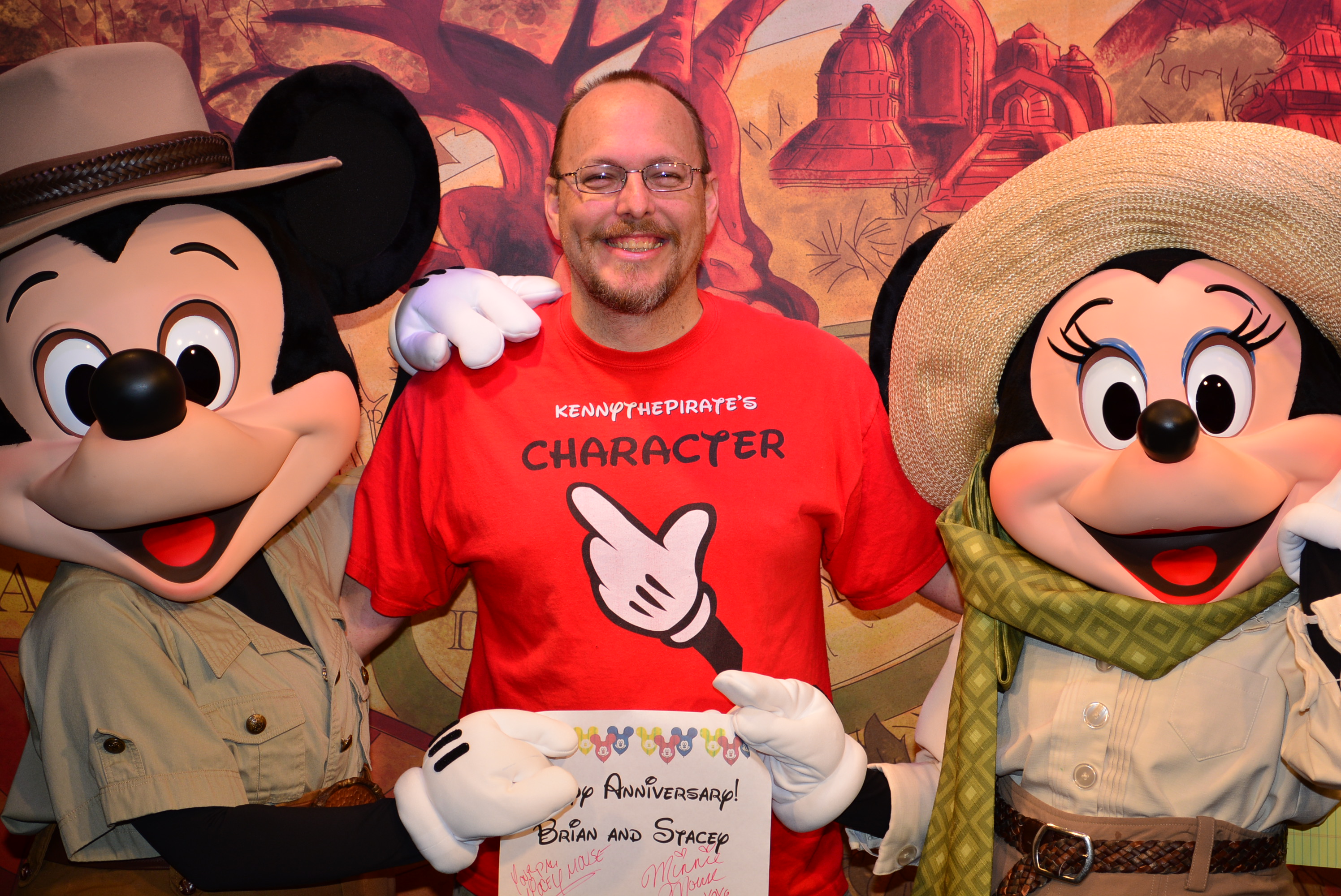 Mickey and Minnie making magic at Animal KIngdom Happy Anniversary