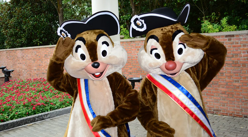 Chip n Dale in Patriotic Revolutionary War costumes in Epcot's American Adventure