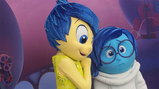 Joy and Sadness from Inside Out Pixar Movie