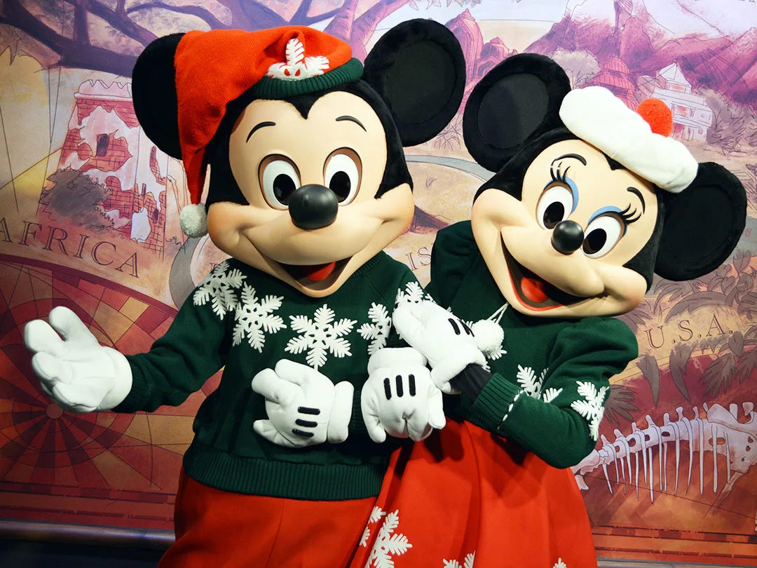 Mickey and Minnie in Christmas attire at Disney's Animal Kingdom