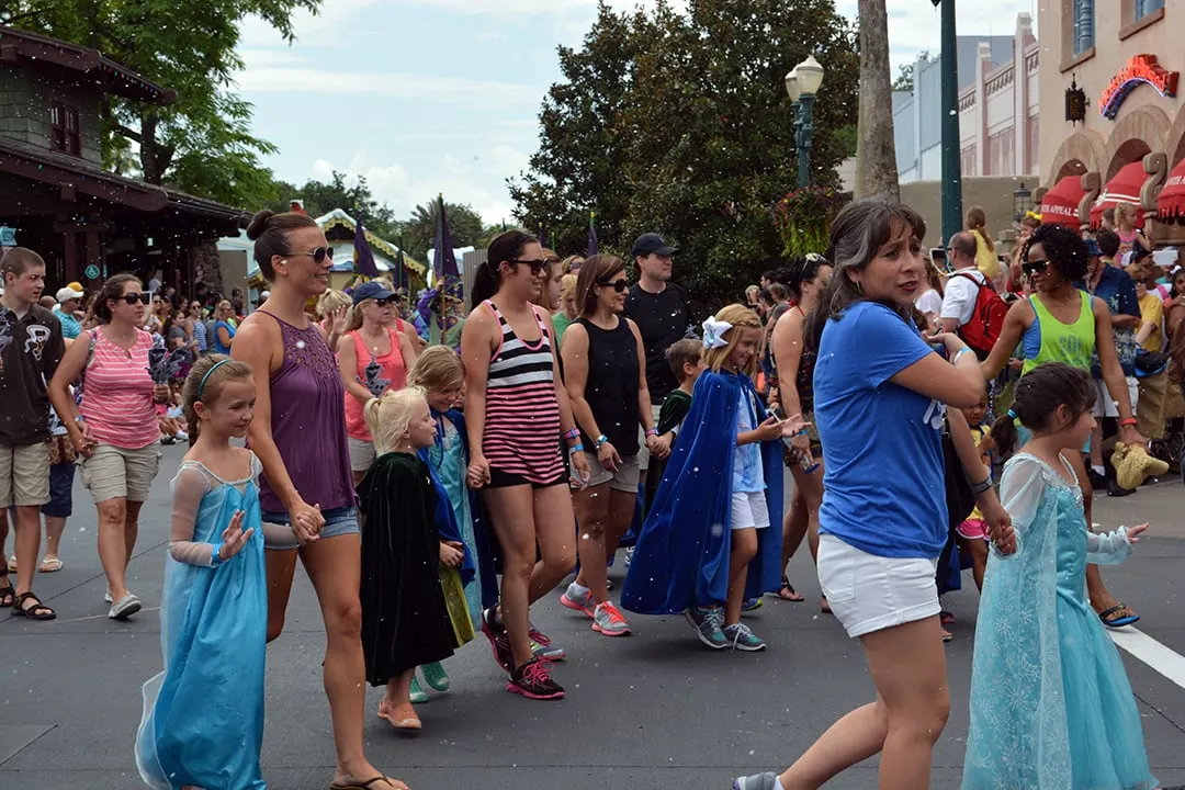 Junior princesses Anna and Elsa's Royal Welcome Parade featuring Kristoff at Hollwood Studios in Disney World