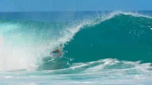 Banzai Pipeline surfer on the North Shore of Ohau Hawaii