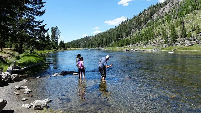 Yellowstone Day 4 Skipping rocks in the river