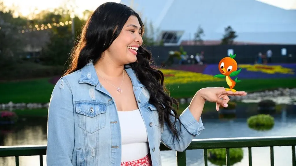 Orange Bird on a finger Magic Shot
