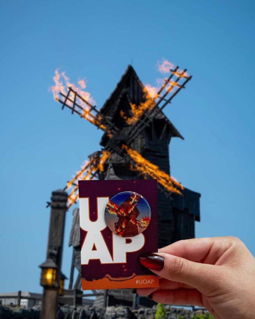 universal passholder burning blade tavern button