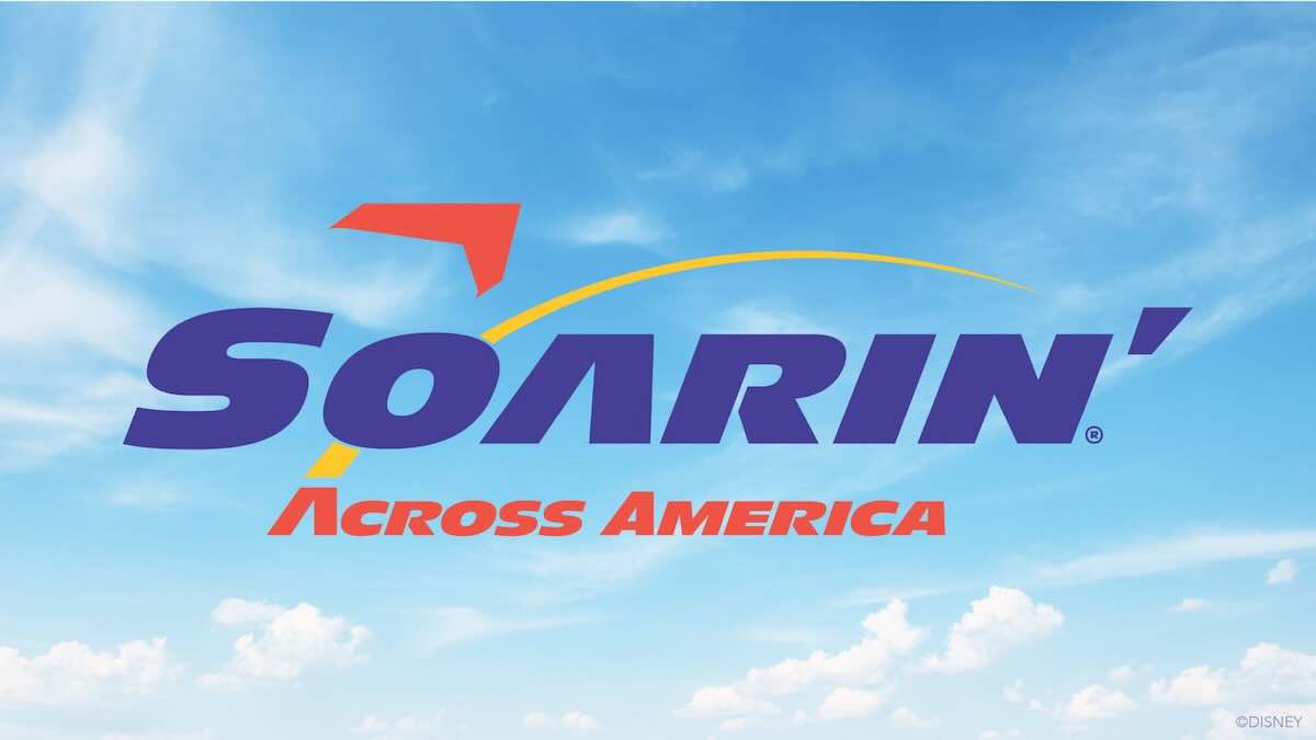 Soarin' Across America Disney theme park attraction with blue sky and clouds background.